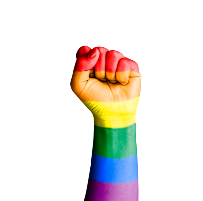 Fist hand with rainbow flag patterned isolate on white